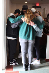 Students gather to pray in Reid Chapel at Samford University.