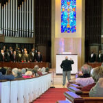 Men’s choral groups performing concert for Discovery Clubs
