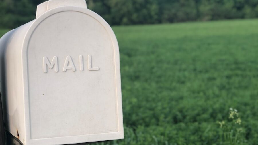 shallow focus photography of gray mailbox