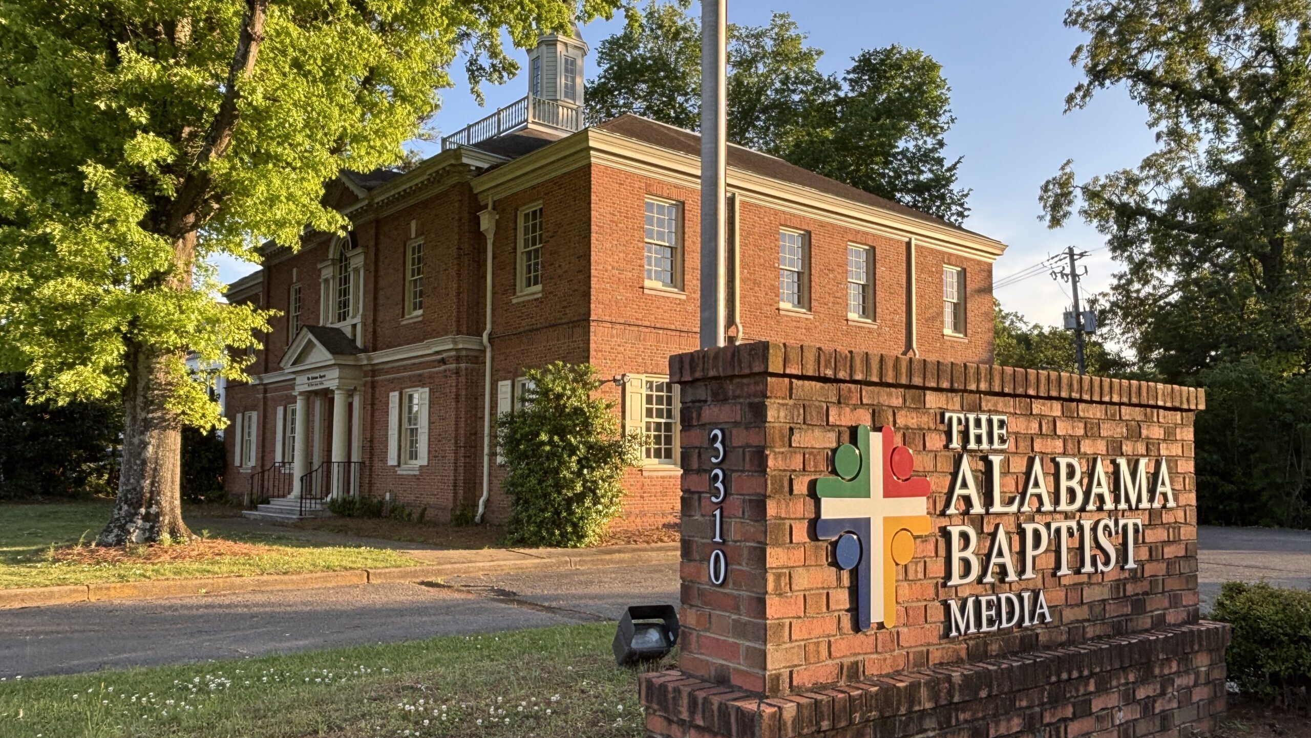 The Alabama Baptist sign in front of the building
